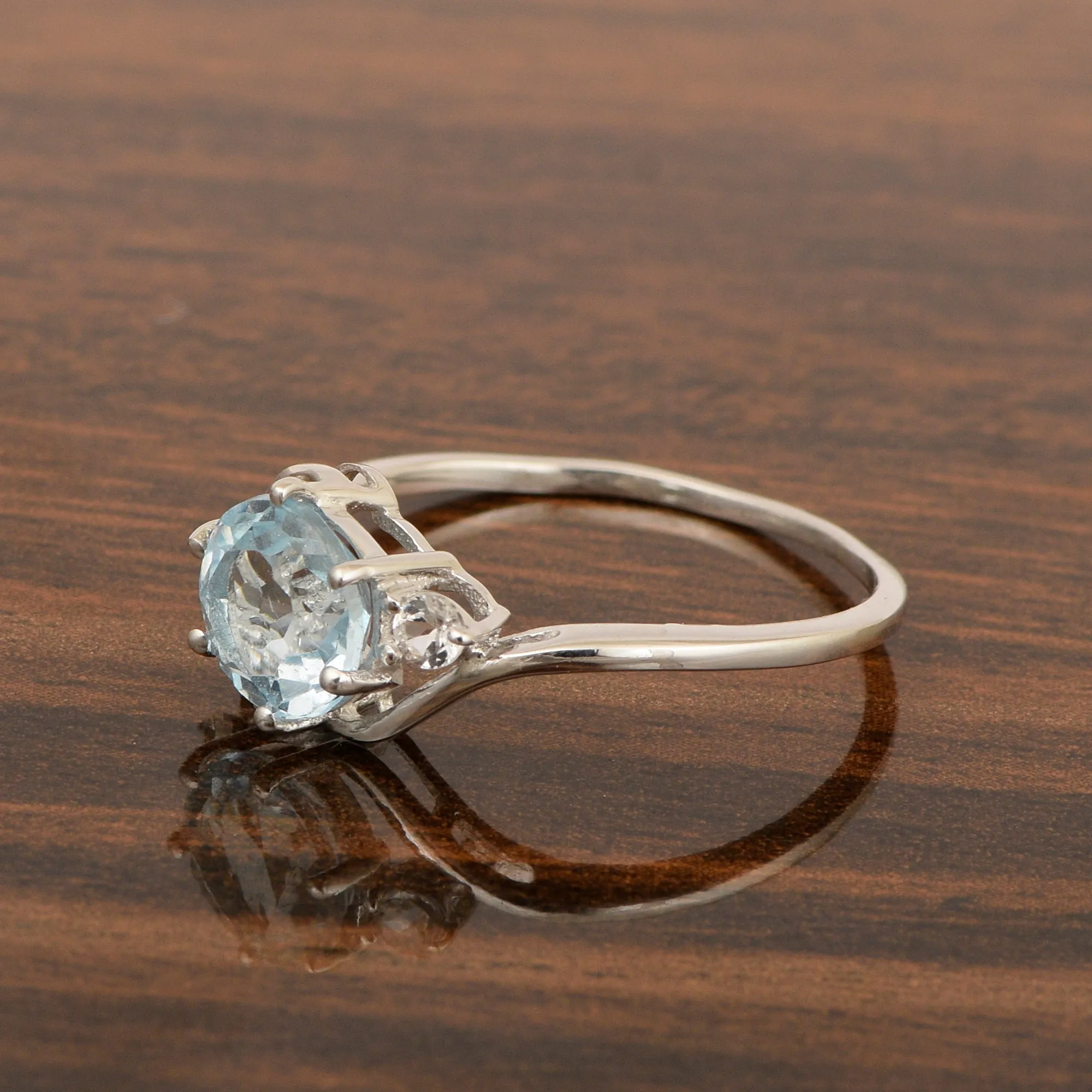 Sterling Silver Timeless Blue Topaz Round 7 MM Women Engagement Ring