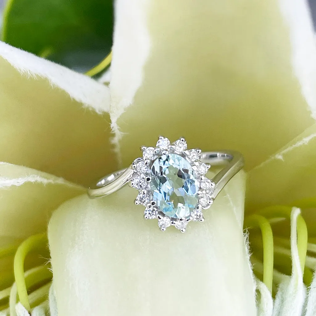 Timeless With A Twist Oval Aquamarine with Diamond Halo Ring