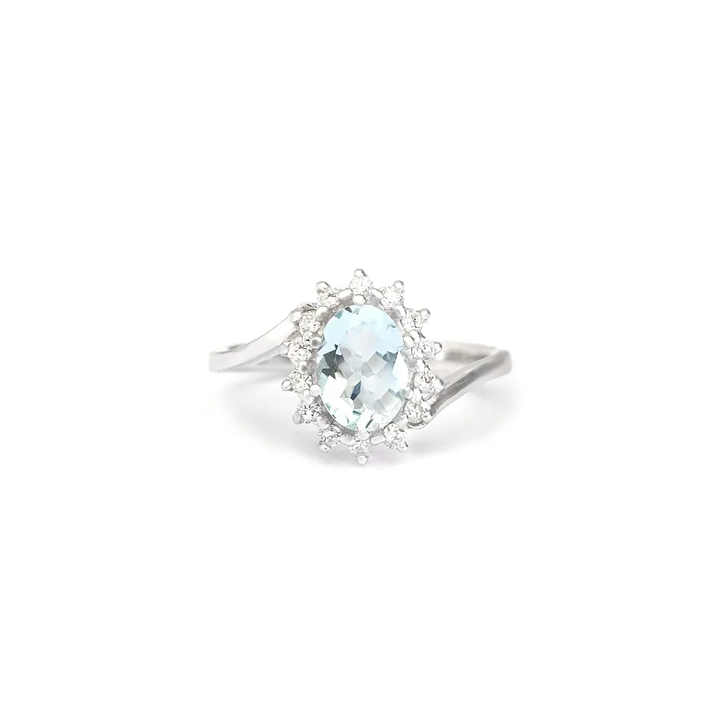 Timeless With A Twist Oval Aquamarine with Diamond Halo Ring