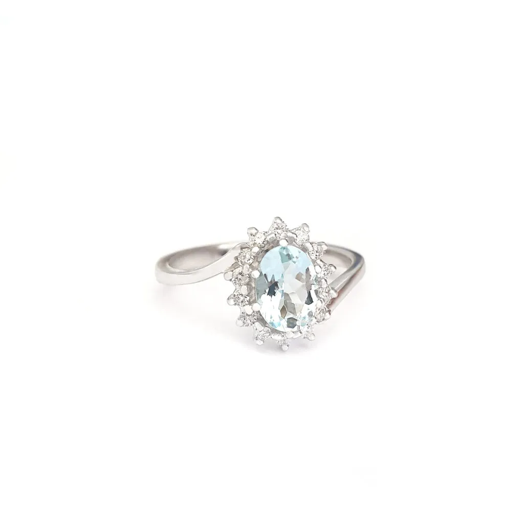 Timeless With A Twist Oval Aquamarine with Diamond Halo Ring