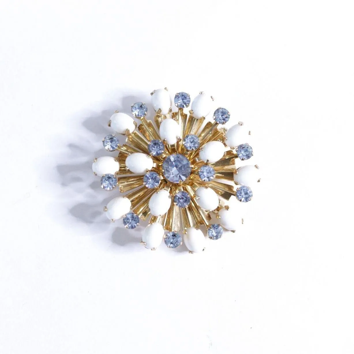 Vintage Milk Glass and Blue Rhinestone Pinwheel Brooch